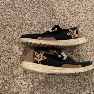 Hey Dude Black and Tan Loafers with Leopard Accent